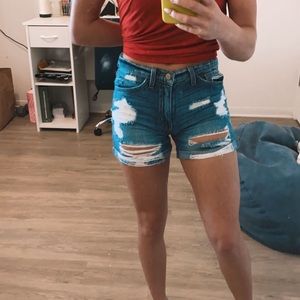 Shredded jean shorts